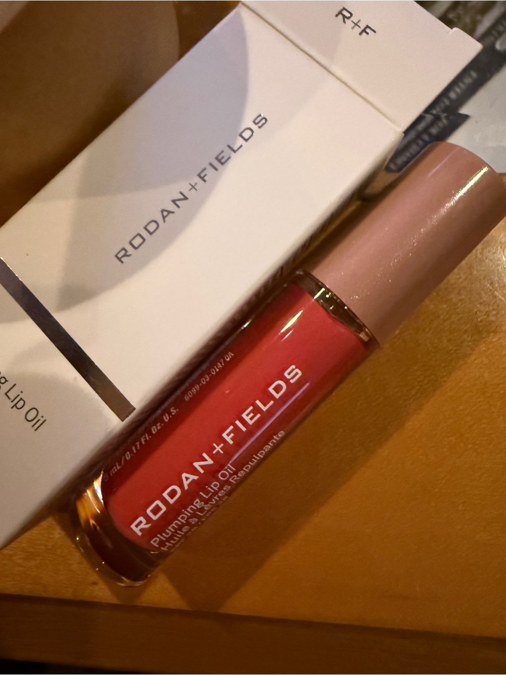 Rodan + Fields plumping sheer coral Lip Oil SPF28 NWT